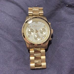 Gold oversized Michael Kors watch